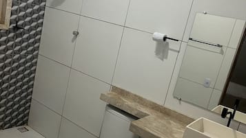 Bidet, towels, toilet paper