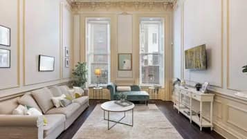 Smart TV, fireplace, books