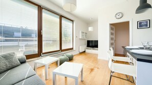Apartament (51) with roof terrace | Living area | Flat-screen TV - Apartamenty Sun & Snow Golden Tulip (Miedzyzdroje)