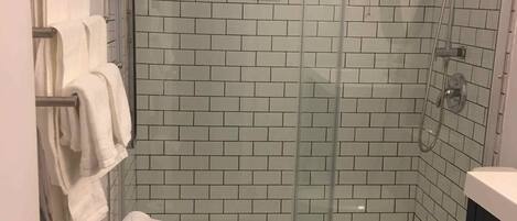 Shower, towels, toilet paper
