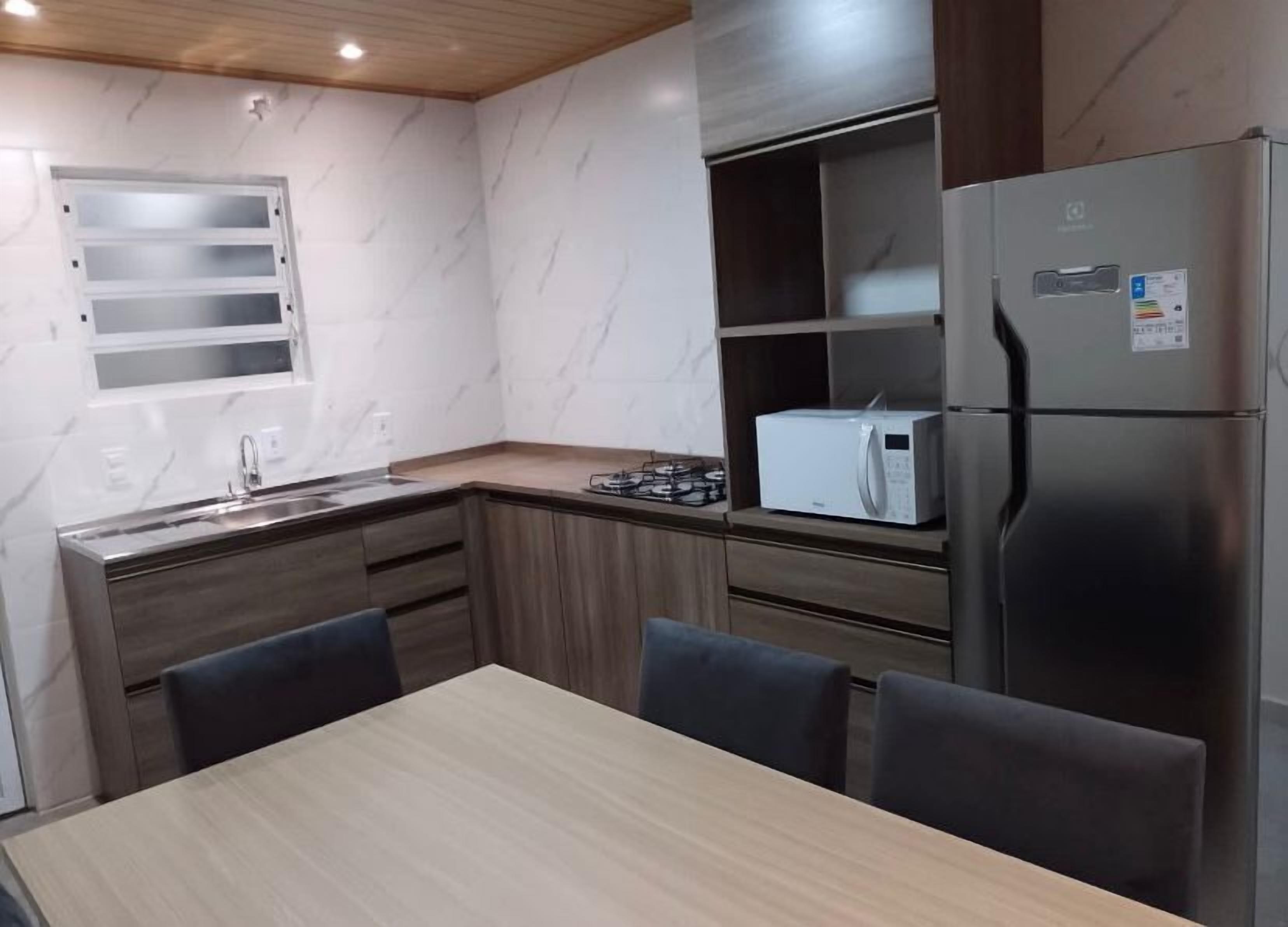 Apartamento superior, vista para o pátio | Cozinha privada