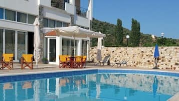 Seasonal outdoor pool, open 8:30 AM to 9:00 PM, sun loungers