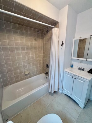 Hair dryer, towels, soap, toilet paper