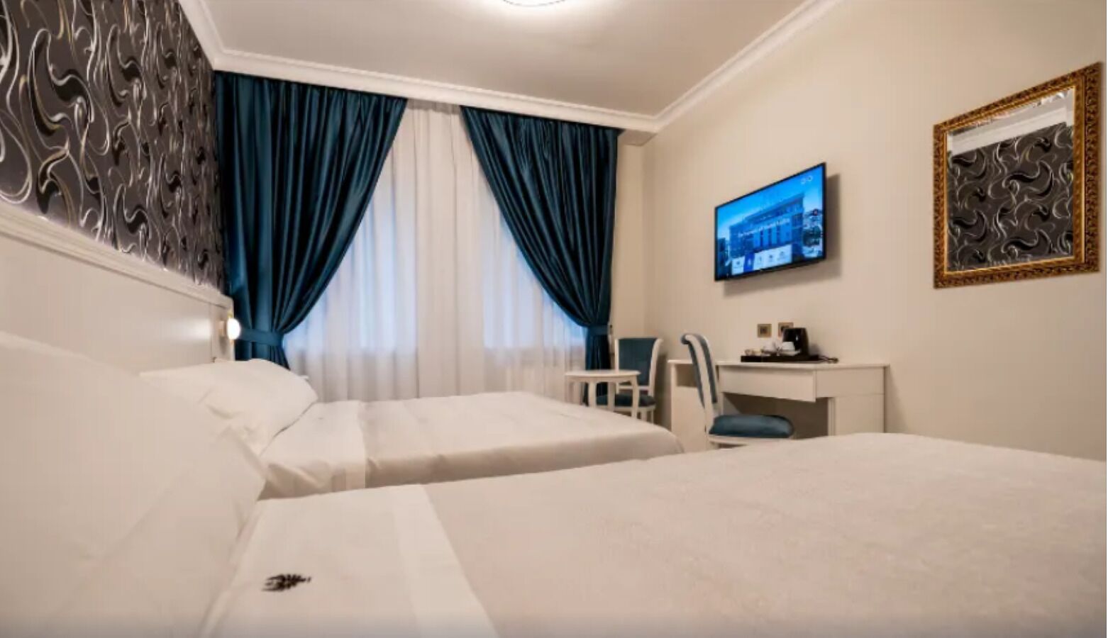 Zweibettzimmer, Stadtblick | Zimmersafe, Verdunkelungsvorhänge, kostenloses WLAN