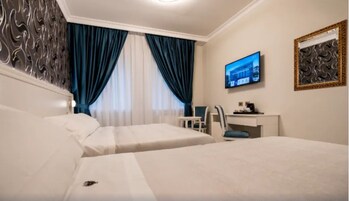 Quarto duplo, vista para a cidade | Cofres nos quartos, cortinas blackout, Wi-Fi de cortesia