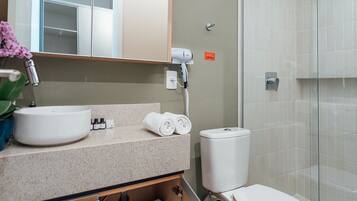 Apartment | Bathroom | Shower, rainfall showerhead, hair dryer, soap