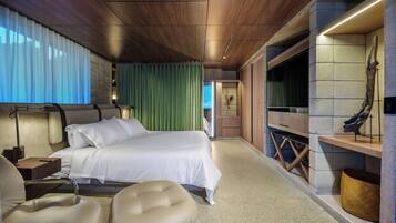 Premium Suite, Hot Tub, City View | In-room safe, desk, blackout drapes, iron/ironing board