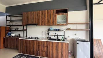 Family Villa, 4 Bedrooms, Garden Area | Private kitchen | Full-size fridge, stovetop, espresso maker, coffee/tea maker