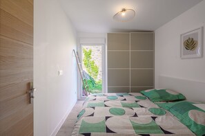 1 chambre, fer et planche à repasser, Wi-Fi gratuit, draps fournis