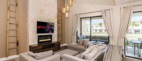 Televisión, chimenea, estéreo y oficina