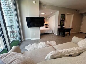 1 bedroom, desk, iron/ironing board, travel crib