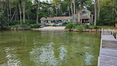 Beach House on the Big Lake with 90-foot dock. Bring your boat! New listing!