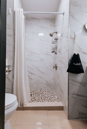 Shower, hair dryer, towels, soap