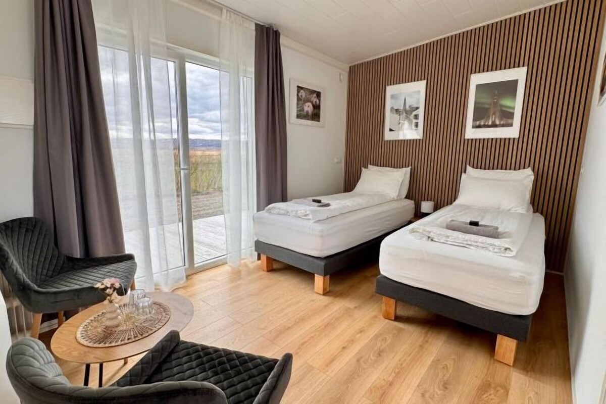 Premium bedding, down duvets, Select Comfort beds, laptop workspace