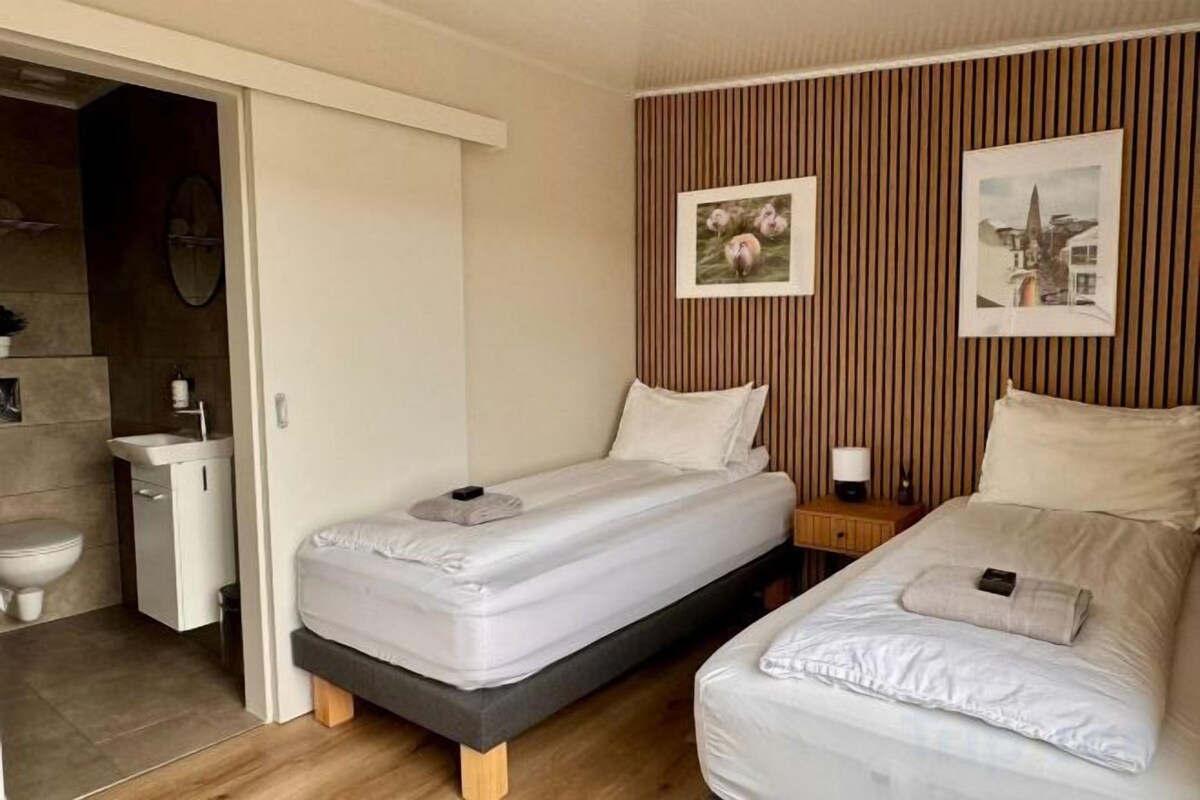 Premium bedding, down duvets, Select Comfort beds, laptop workspace
