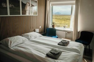 Premium bedding, down comforters, Select Comfort beds, laptop workspace