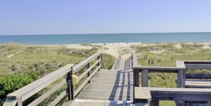 A wooden boardwalk leading to a beach with a clear view of the ocean. - "Peace of Paradise" Emerald Isle - Water Views, 2 Pools, Beach (Emerald Isle)