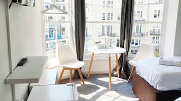 Triple Room, Sea View | Desk, iron/ironing board, free WiFi, bed sheets