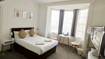 Family Room, Multiple Beds, Ensuite | Desk, iron/ironing board, free WiFi, bed sheets