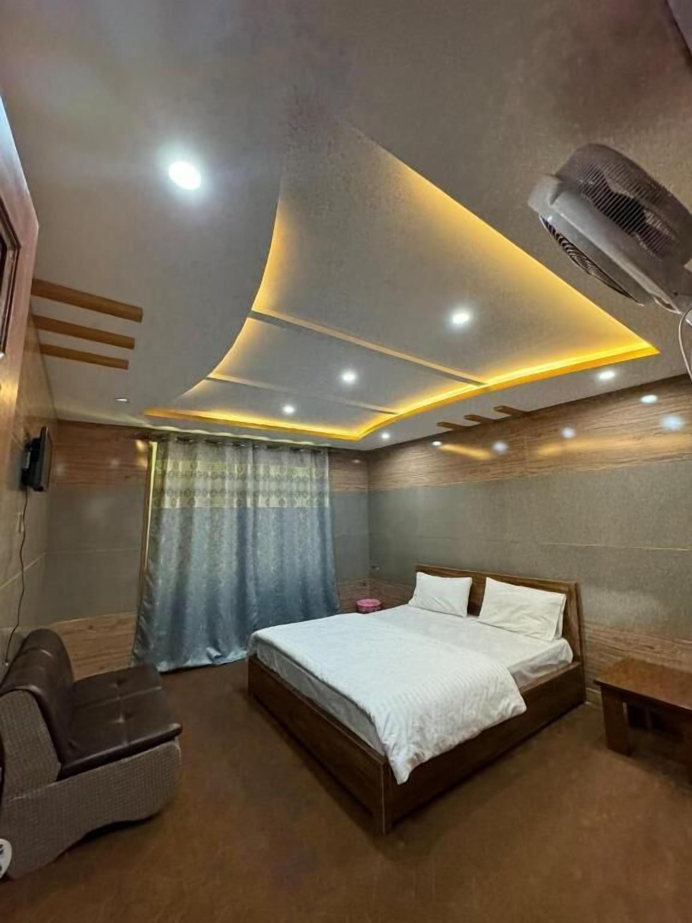 Chambre Double Deluxe, vue partielle sur l'océan | Chambres insonorisées, fer et planche à repasser, Wi-Fi gratuit