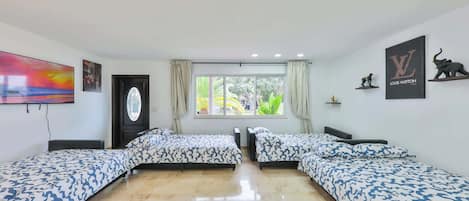 4 bedrooms, desk, iron/ironing board, travel cot