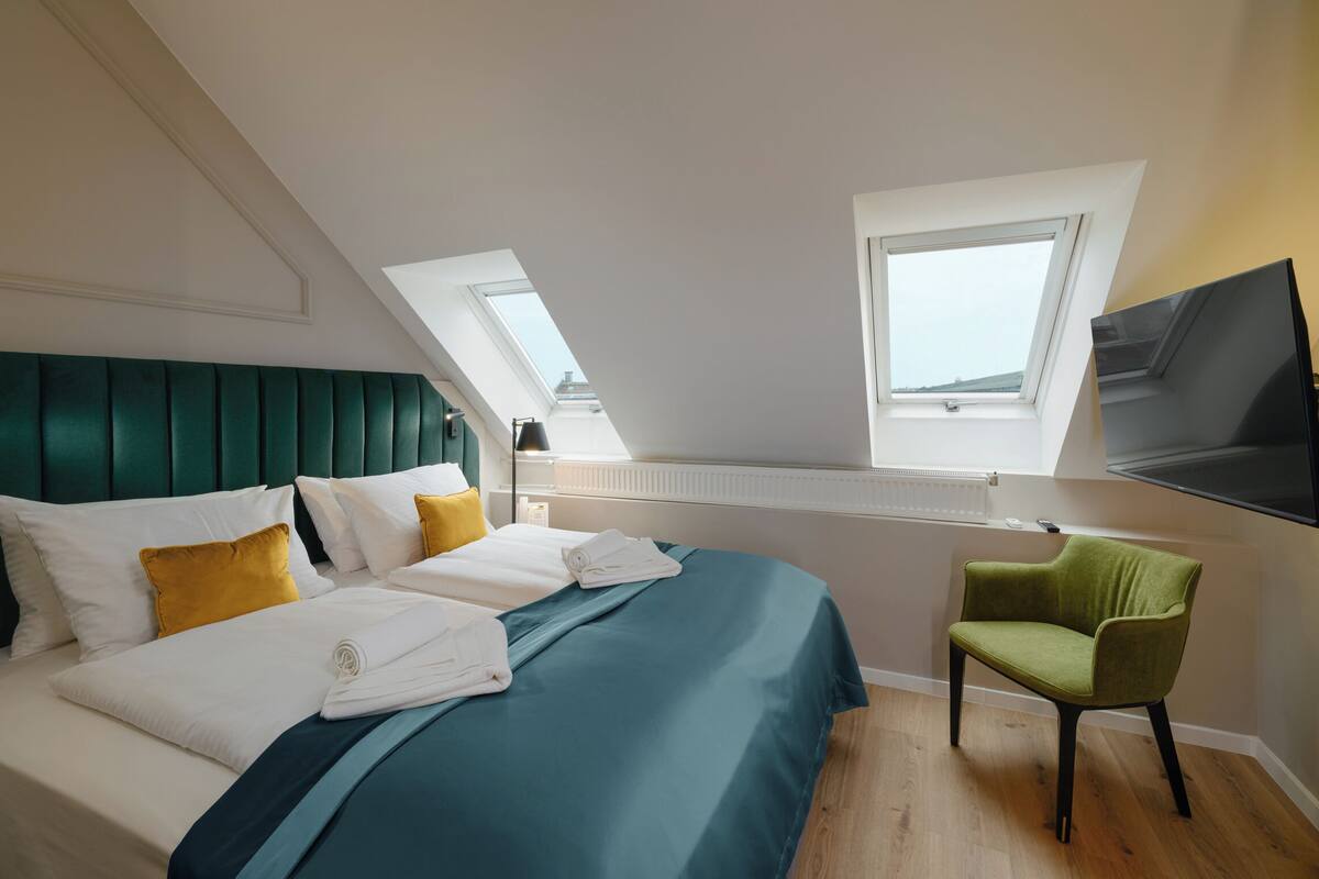 Suite | Premium bedding, memory foam beds, in-room safe, desk