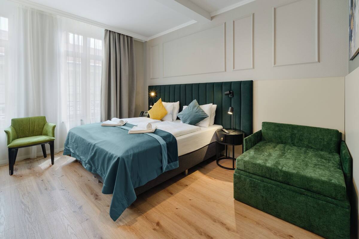 Superior Double with Extra Bed | Premium bedding, memory foam beds, in-room safe, desk
