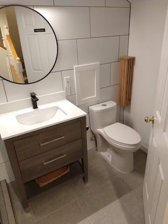 Shower, hair dryer, towels, soap. Spacious, Light & Bright West Van Suite