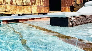 Seasonal outdoor pool, open 8:00 AM to 10:00 PM, sun loungers