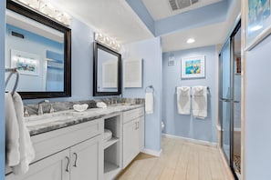 Shower, hair dryer, towels