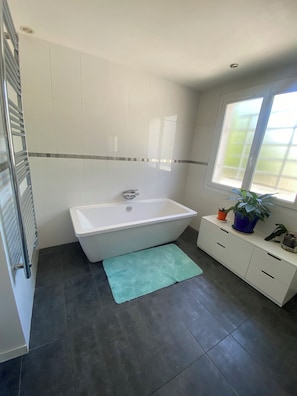 Shower, hair dryer, towels, soap
