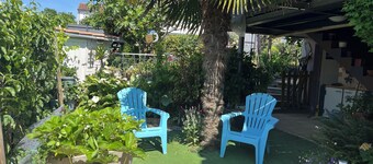 Ground floor of house with garden and barbecue; 900m from beach