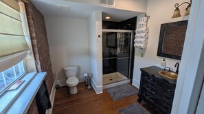 Shower, hair dryer, towels, soap