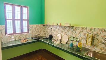 Deluxe Suite, Balcony, City View | Private kitchen | Full-size fridge, microwave, cookware/dishes/utensils