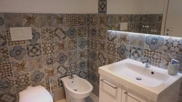 Hair dryer, towels, toilet paper