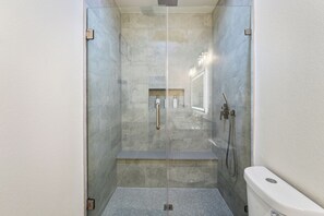 Shower, hair dryer, towels, soap