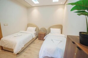 2 dormitorios, tabla de planchar con plancha, wifi y ropa de cama