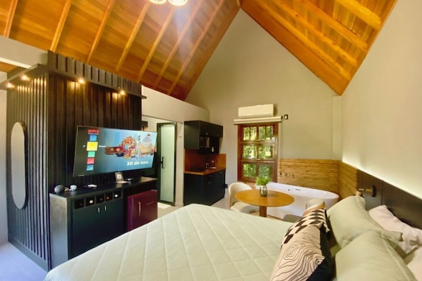 Romantic Chalet | Minibar, individually furnished, laptop workspace, blackout drapes
