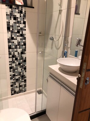 Shower, towels, soap, toilet paper