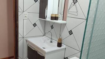Hair dryer, towels, soap, shampoo