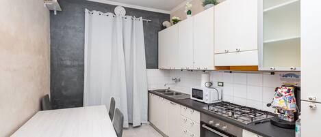 Familjelägenhet - utsikt mot staden | Eget kök