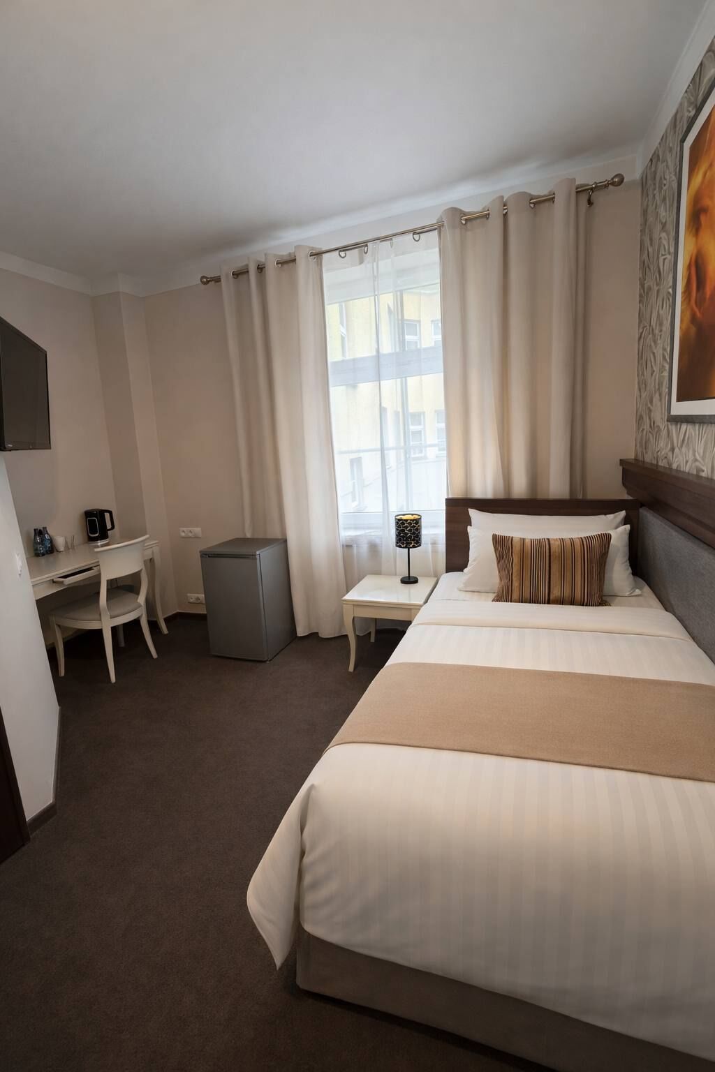 Deluxe-enkeltværelse | Minibar, skrivebord, arbejdsområde til bærbare computere, gratis Wi-Fi