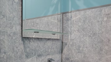 Shower, towels, soap, toilet paper