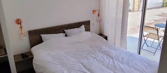 Country-style bedroom and bathroom