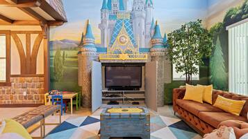 Smart TV, DVD player, table football, books