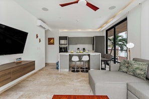 Relax and unwind in this comfortable setup. - Oceanview Rooftop Pool & Beach Club Access (Playa del Carmen)
