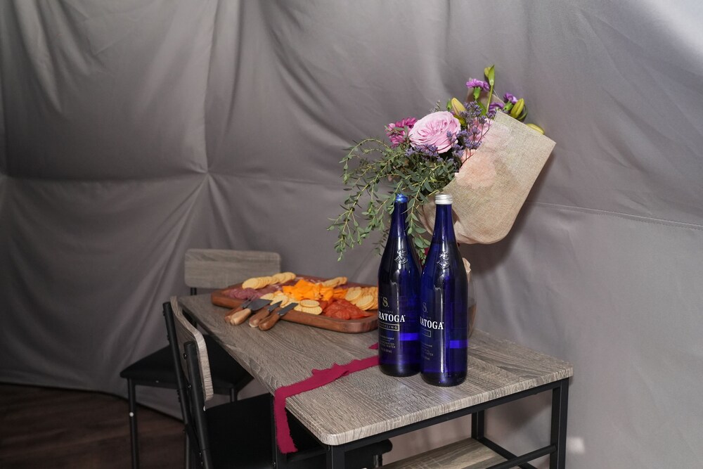 Breakfast tray with food and flowers in the dome