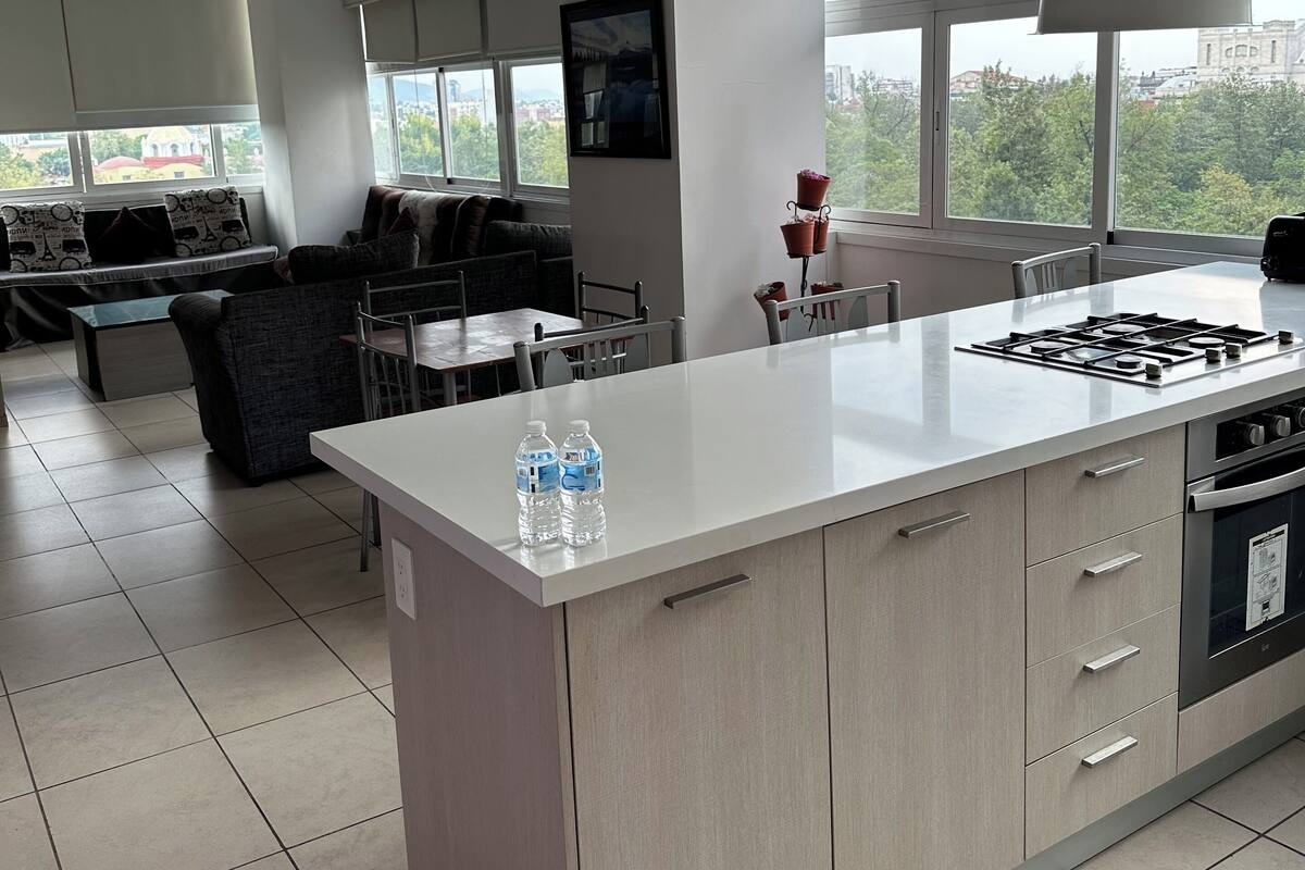 Superior Apartment | Desk, laptop workspace, blackout drapes, soundproofing