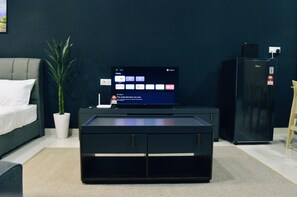 Family Studio, City View | Living area | 43-inch Smart TV with cable channels, Netflix, streaming services