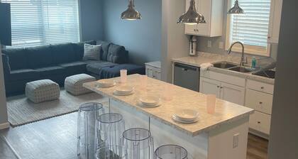 5 Bedrooms, 3 full baths, 1 outdoor shower. Walking distance to all attractions.